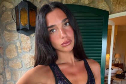 Dua Lipa is a bombshell in plunging zebra-print look amid Swedish getaway