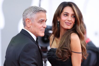 Amal Clooney makes glamorous red carpet return and shares tender moment with George