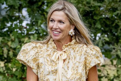 Queen Máxima gets behind the wheel of a tractor in glamorous royal look