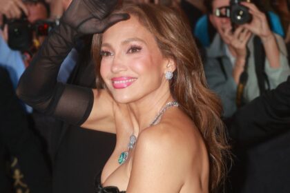 Jennifer Lopez looks like modern royalty in dramatic black gown and dazzling jewels in Milan