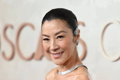 Michelle Yeoh, 63, reveals toned legs on beach getaway with husband, 80, for third wedding anniversary