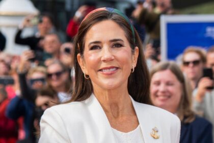 Queen Mary steps out in a classic print with an unexpected glamorous twist