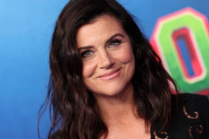 Tiffani Thiessen, 52, sizzles in olive green bathing suit during family’s lakeside vacation