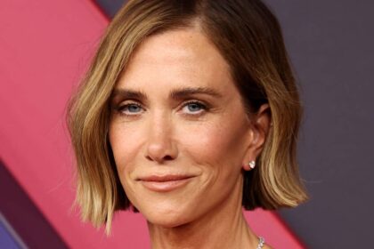 Kristen Wiig, 53, stuns in black bra and lace stockings for sultriest poolside pictures