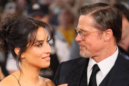 Brad Pitt’s younger girlfriend, 33, turns heads in plunging gown