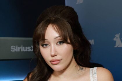 Noah Cyrus flaunts curvy figure in string bikini during overseas trip