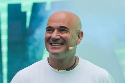 Andre Agassi hugs rarely-seen daughter Jaz, 22, as pair attend the US Open in heartwarming new photo