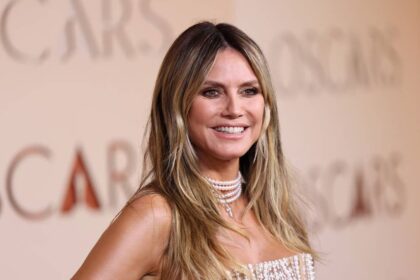Heidi Klum, 53, turns up the heat in tiny sequin bikini on boat