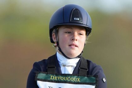 Mia Tindall is the mirror image of her mum Zara Tindall as she gets into the saddle at horse riding competition