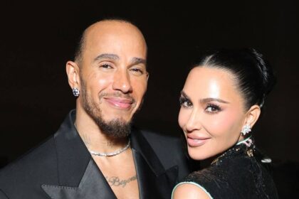 Kim Kardashian and Lewis Hamilton share public kiss during dazzling date night