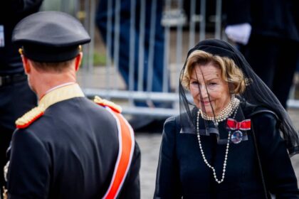 King Haakon reaches for grieving mother Queen Sonja’s hand in emotional moment