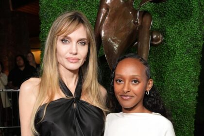 Angelina Jolie and Zahara hold hands and match in stunning black looks