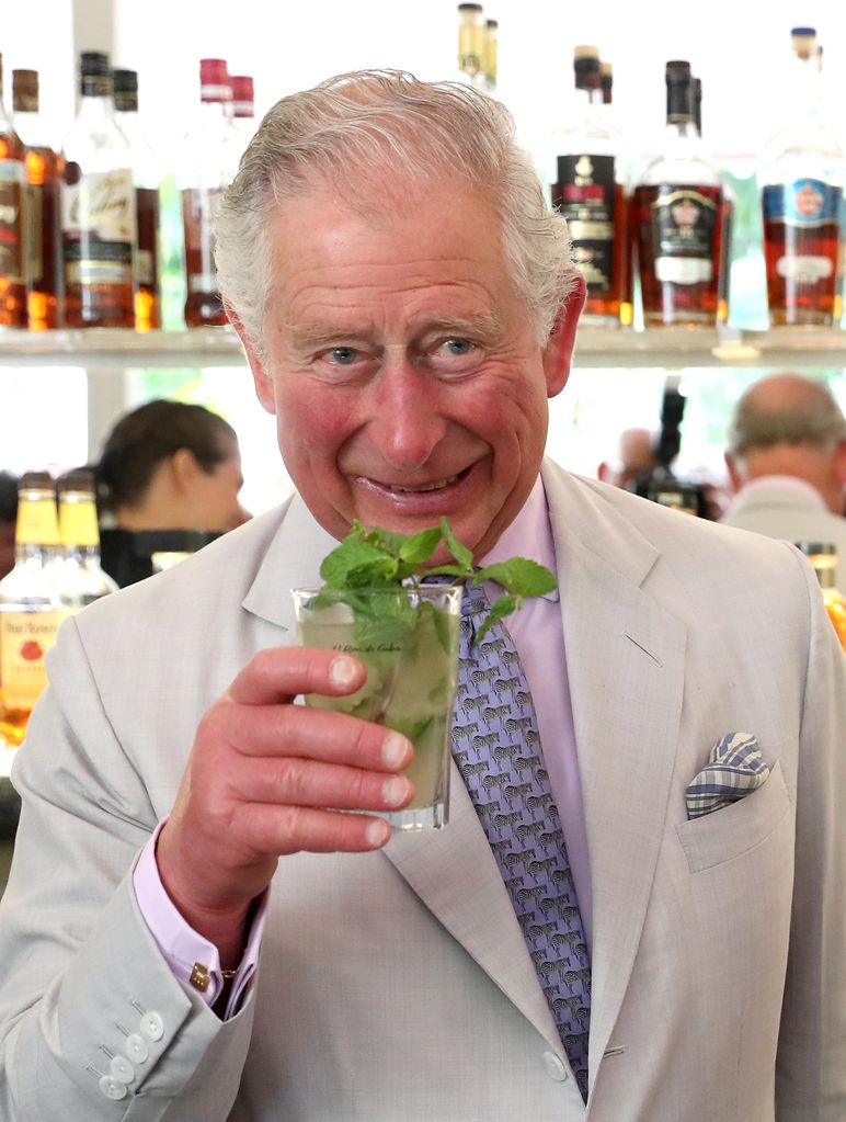 King Charles drinking a mojito garnished with mint during Cuba visit 