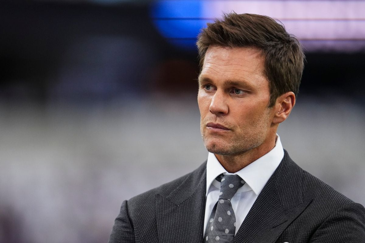  Tom Brady looks on prior to an NFL football game between the Baltimore Ravens and the Dallas Cowboys at AT&T Stadium on September 22, 2024 in Arlington, Texas. (Photo by Cooper Neill/Getty Images)