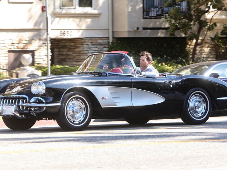 1010-Ashton-Kutcher-Driving-Corvette-SUB