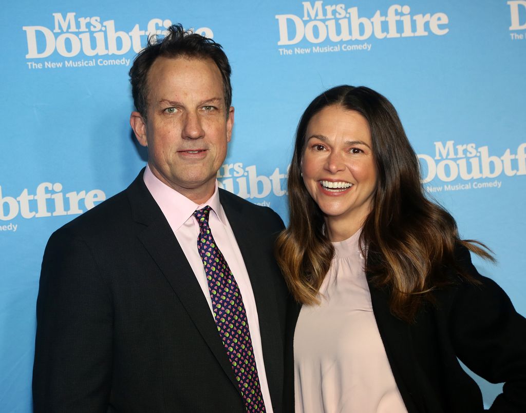 Ted Griffin and Sutton Foster pose at the opening night of the new musical based on the film "Mr. Doubtfire" on Broadway at The Stephen Sondheim Theatre on December 5, 2021 in New York City