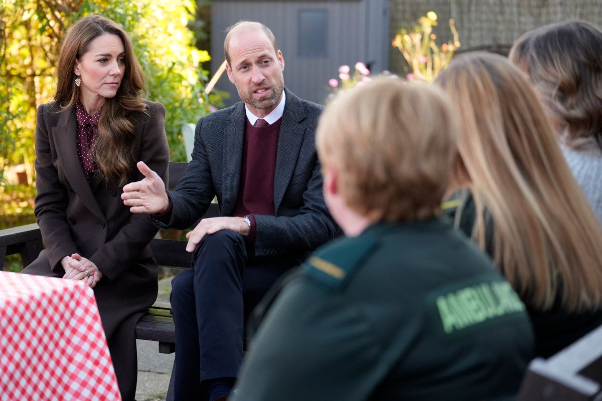 Britain's Prince William, Prince of Wales and Britain's Catherine, Princess of Wales speak to members of the emergency services during a visit to Southport Community Centre in Southport, north west England on October 10, 2024, where they met rescue workers and the families of those caught up in the Southport knife attack earlier this year. Bebe King, six, Elsie Dot Stancombe, seven, and Alice da Silva Aguiar, nine, all died in an attack at a Taylor Swift-themed dance class in the town just oon July 29, which also left ten people injured, eight of them children. (Photo by Danny Lawson / POOL / AFP) (Photo by DANNY LAWSON/POOL/AFP via Getty Images)