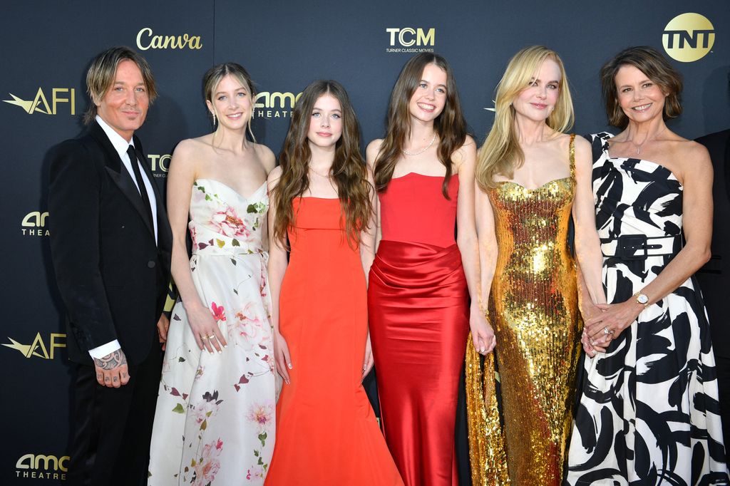 Nicole with husband Keith and their teen daughters and niece 