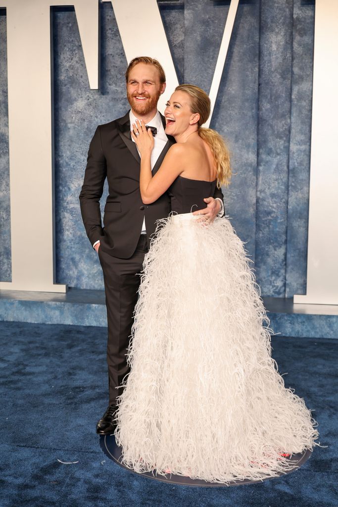 Wyatt Russell and Meredith Hagner attend the 2023 Vanity Fair Oscar Party Hosted By Radhika Jones at Wallis Annenberg Center for the Performing Arts on March 12, 2023 in Beverly Hills, California