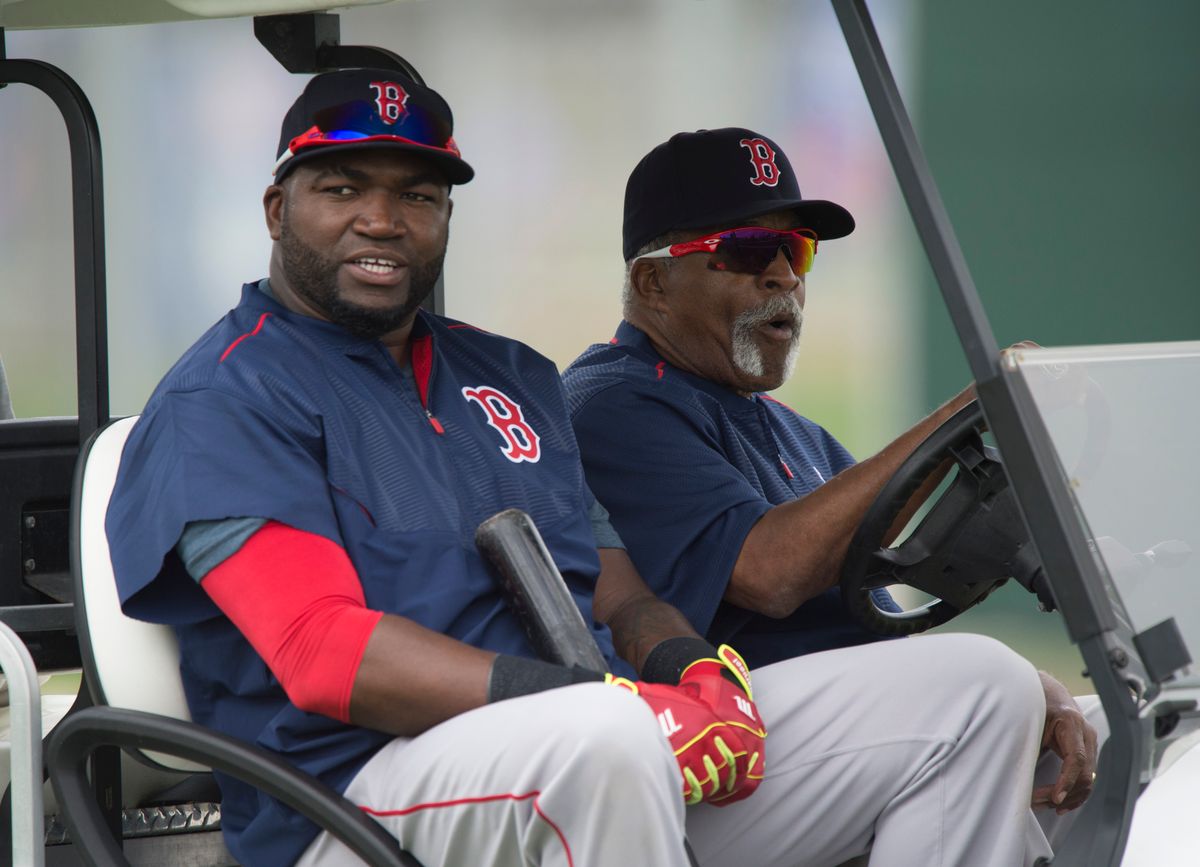  David Ortiz #34 of the Boston Red Sox  gets a ride from Luis Tiant during the first full squad workout at Fenway South in Fort Myers, Florida on February 25, 2015. (Photo by Michael Ivins/Boston Red Sox/Getty Images)