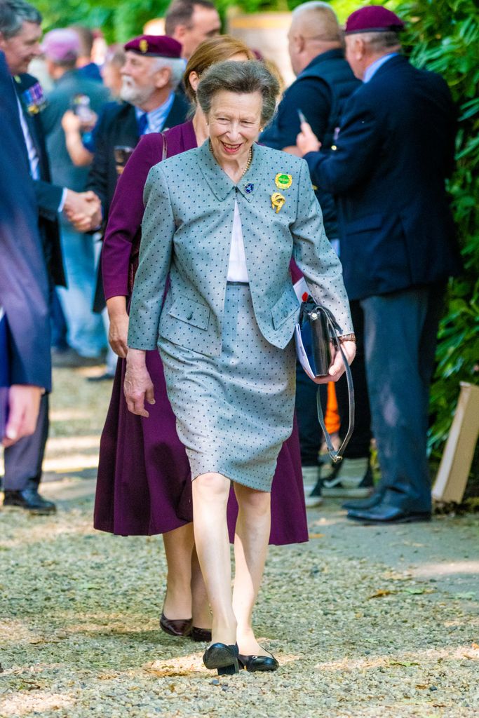 princess anne walking in skirt suit