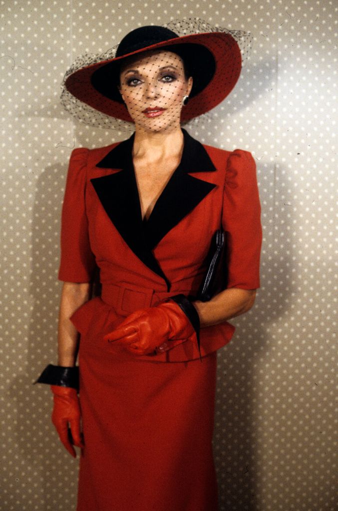 Joan Collins in Dynasty wearing a red suit