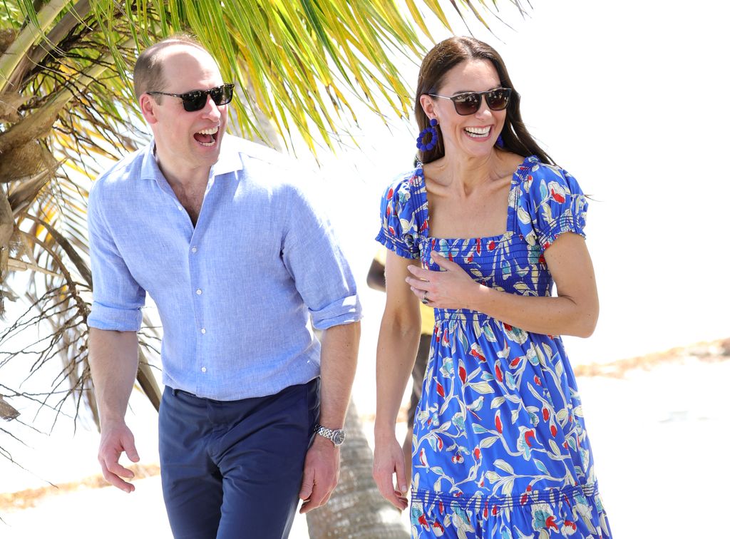 prince william and princess kate laughing on beach