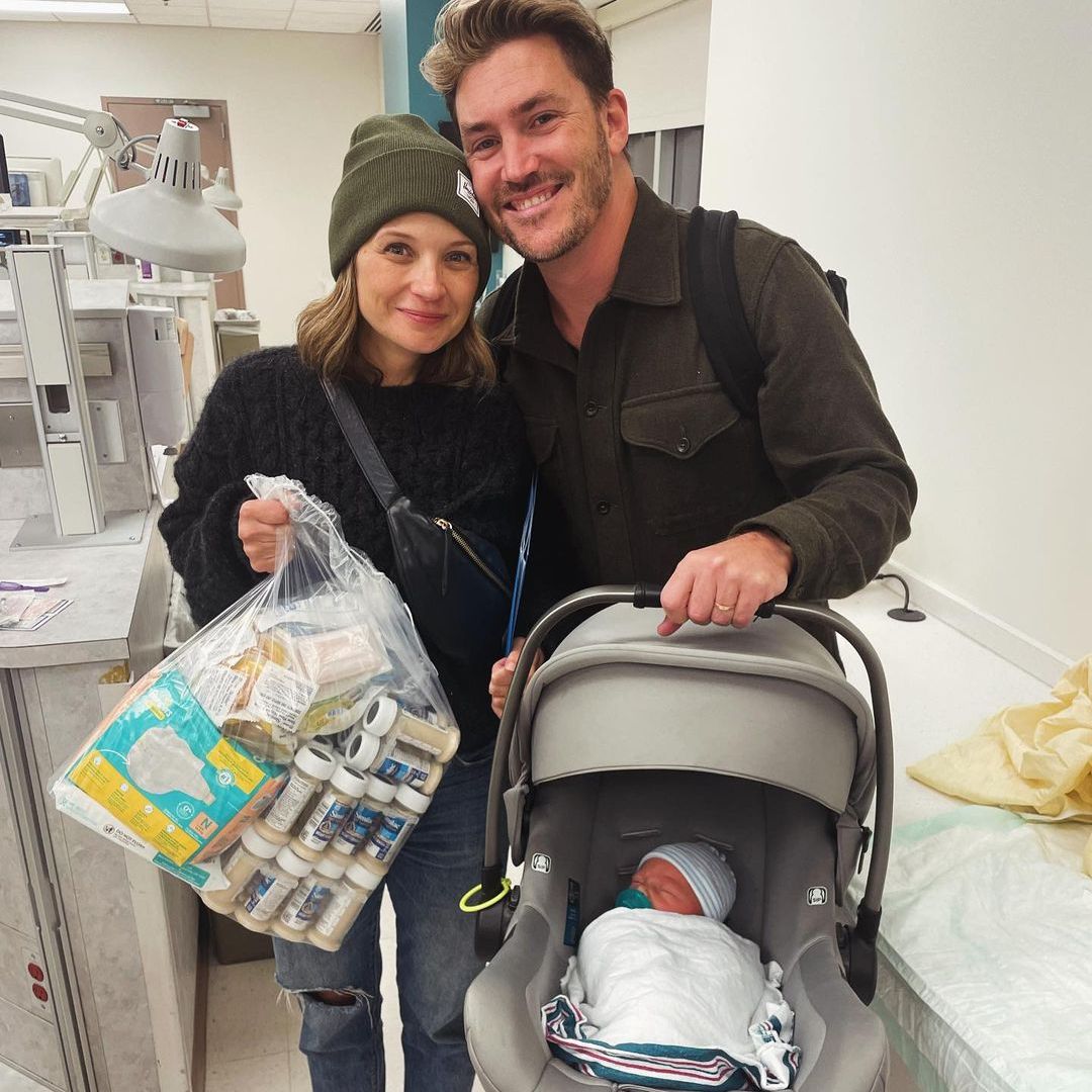 Vanessa Ray and her husband Landon Bear with their baby boy Isaac, shared on Instagram