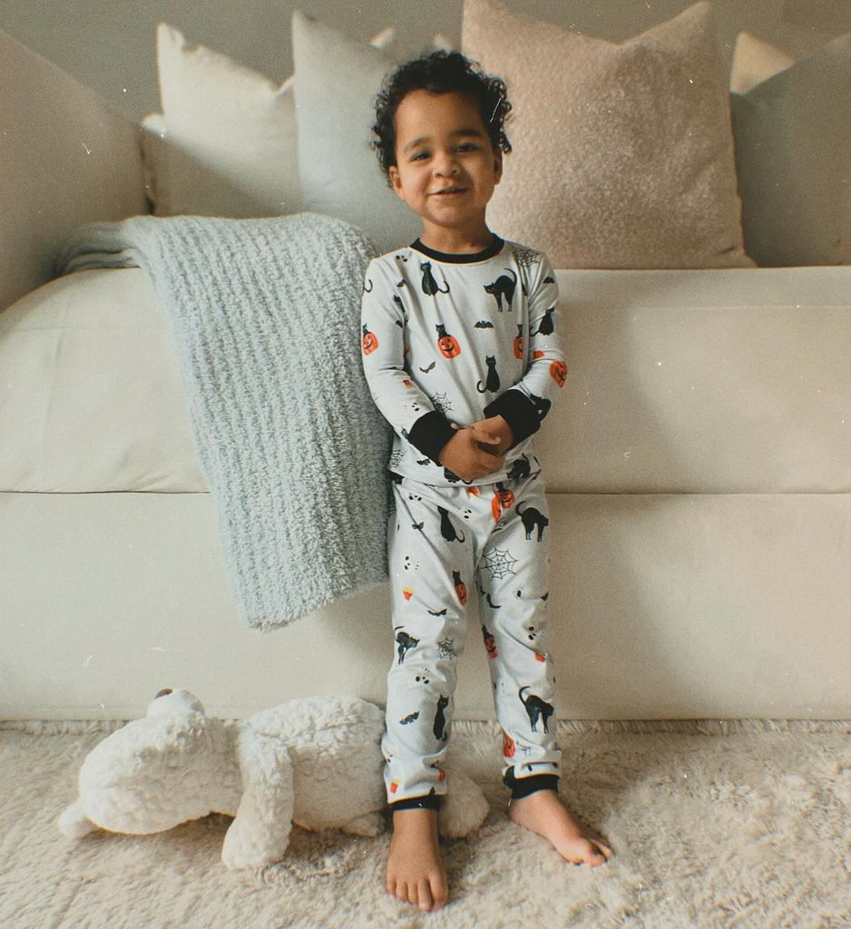 khloe kardashian son tatum wearing halloween-themed pajamas