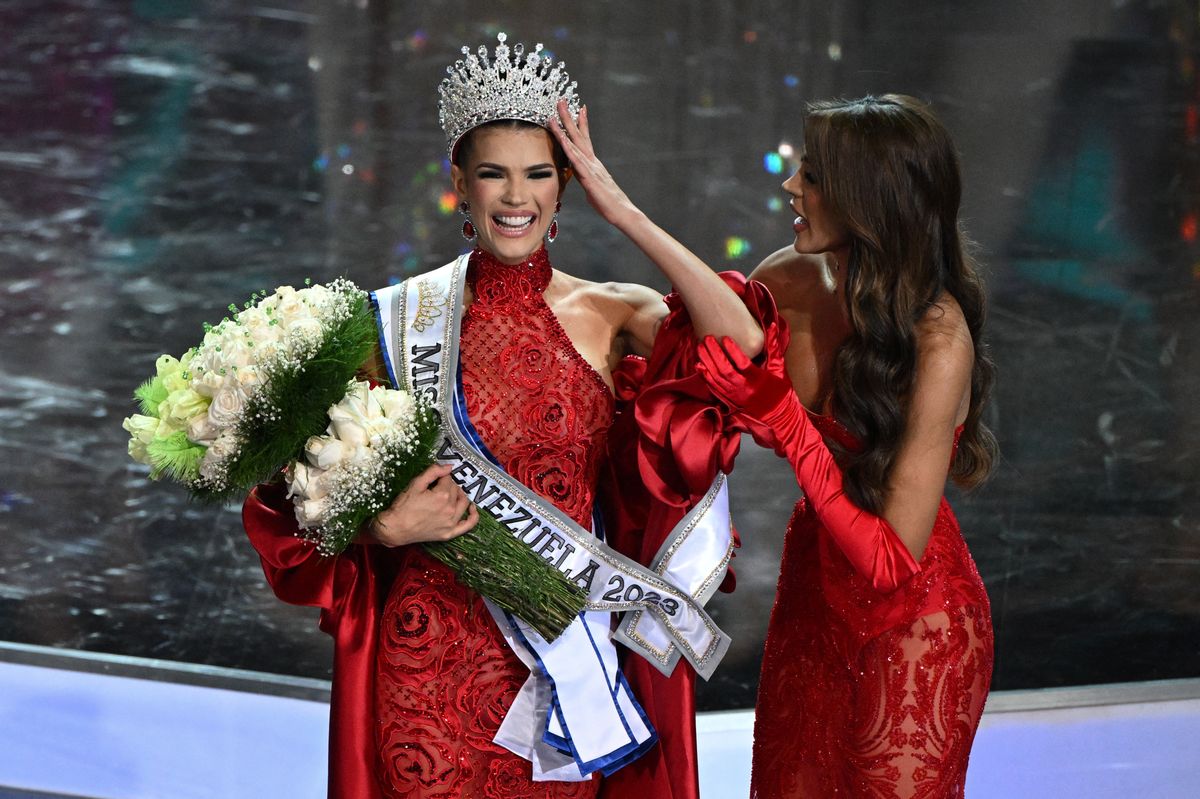 Miss Venezuela 2023 Ileana Marquez (L) of the Amazonas state is crowned by outgoing Miss Venezuela 2022 Diana Silva during Miss Venezuela beauty pageant in Caracas on December 7, 2023. (Photo by Federico PARRA / AFP) (Photo by FEDERICO PARRA/AFP via Getty Images)