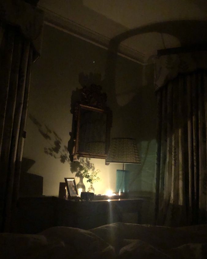 A bedroom in low lighting