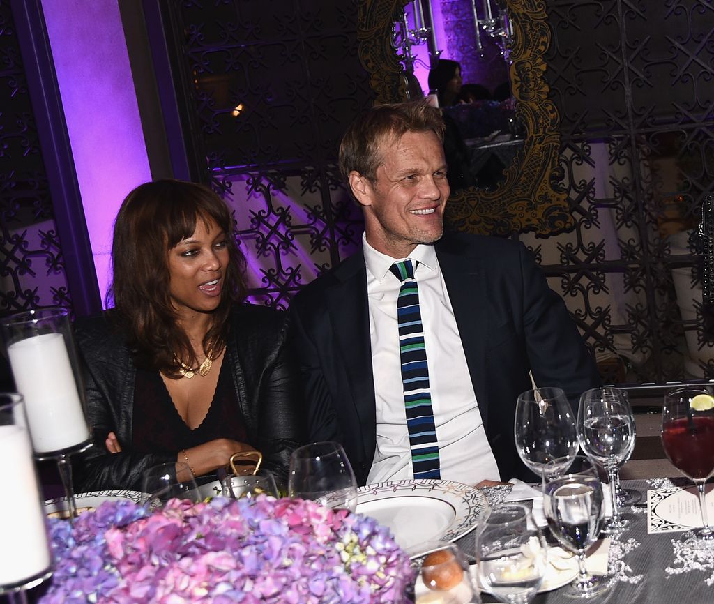 Model Tyra Banks and photographer Erik Asla attends the August Getty Atelier Dinner at the Montage Hotel Rooftop Grill on November 19, 2014