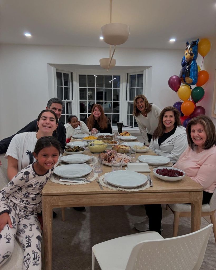 Hoda with her family at the table for Thanksgiving