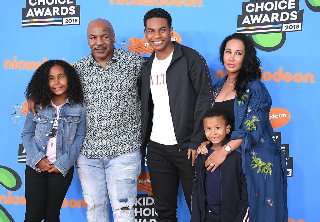 Mike Tyson arrives at the Nickelodeon's 2018 Kids' Choice Awards with wife Kiki and three of his kids