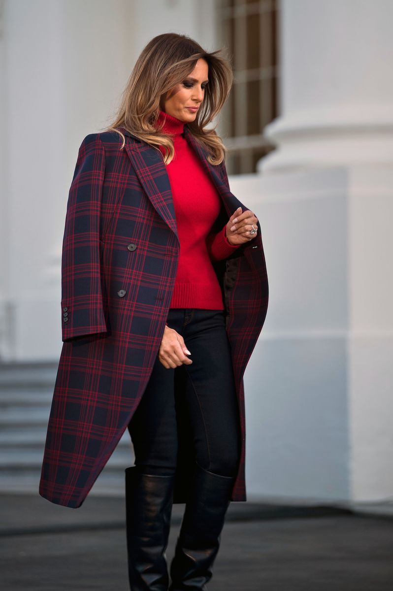 Melania Trump arrives to receive a Christmas tree during an event at the White House.