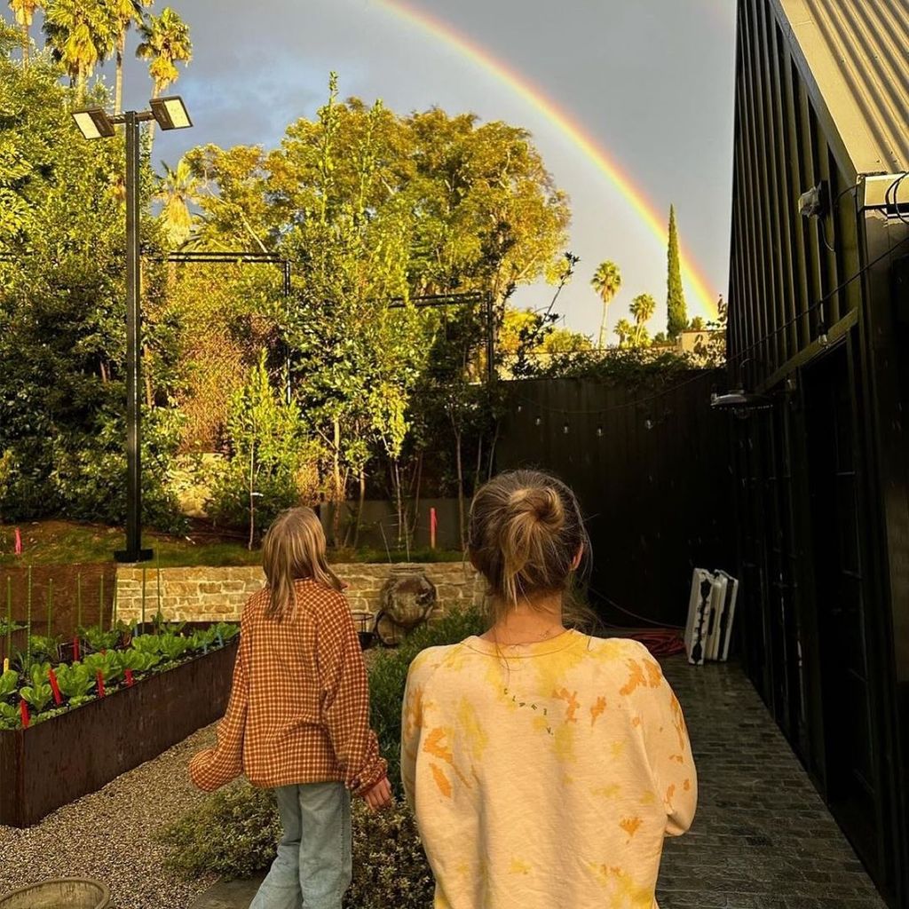 Kristen and Dax's two children in their garden at home