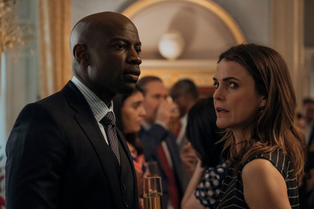 David Gyasi as Austin Dennison and Keri Russell as Kate Wyler