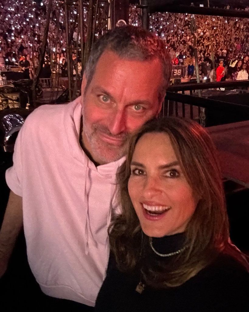 Mariska Hargitay and Peter Hermann pose for a selfie while seeing Taylor Swift's "Eras Tour" in Toronto, shared on Instagram