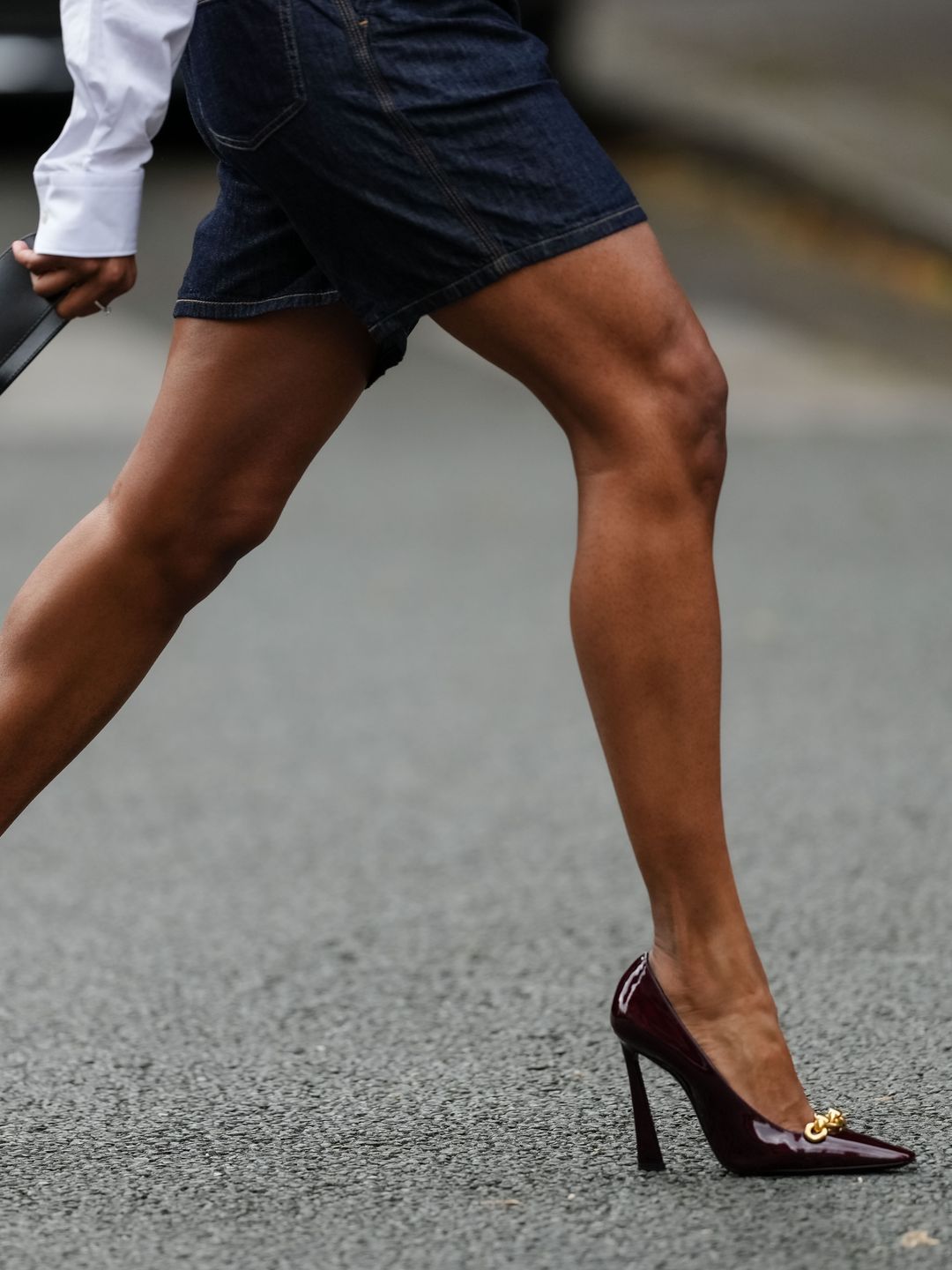 women in heels burgundy leather