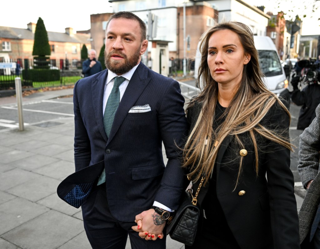 Dublin , Ireland - 22 November 2024; Mr Conor McGregor, with his partner Dee Devlin leave the court, as the court breaks for the jury's decision in the civil action case, P Ní Laimhin v McGregor & Anor, in High Court 24 at Chancery Place in Dublin. (Photo By David Fitzgerald/Sportsfile via Getty Images)