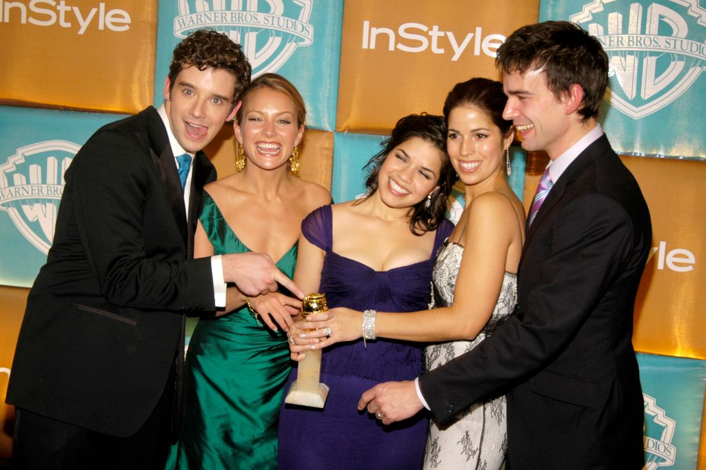 Becki Newton with her Ugly Betty co-stars