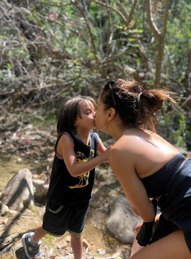 Eva Longoria and her son kissing on the lips