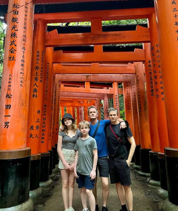 Neil Patrick Harris, David Burtka and their twins underneath Japanese arches