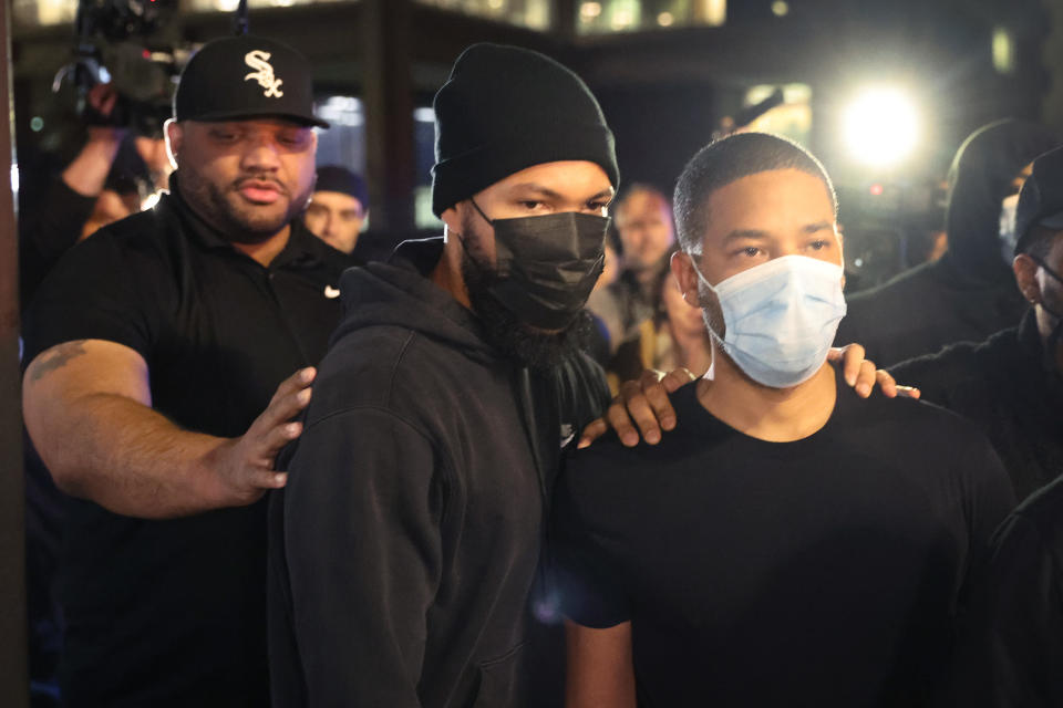 Smollett (light mask) is released from the Cook County Department of Corrections detention center on March 16, 2022.