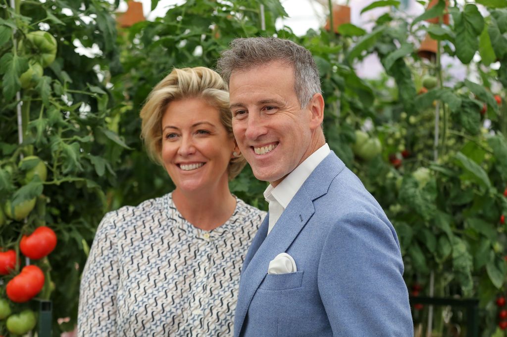 Hannah Summers and Anton Du Beke smiling in garden