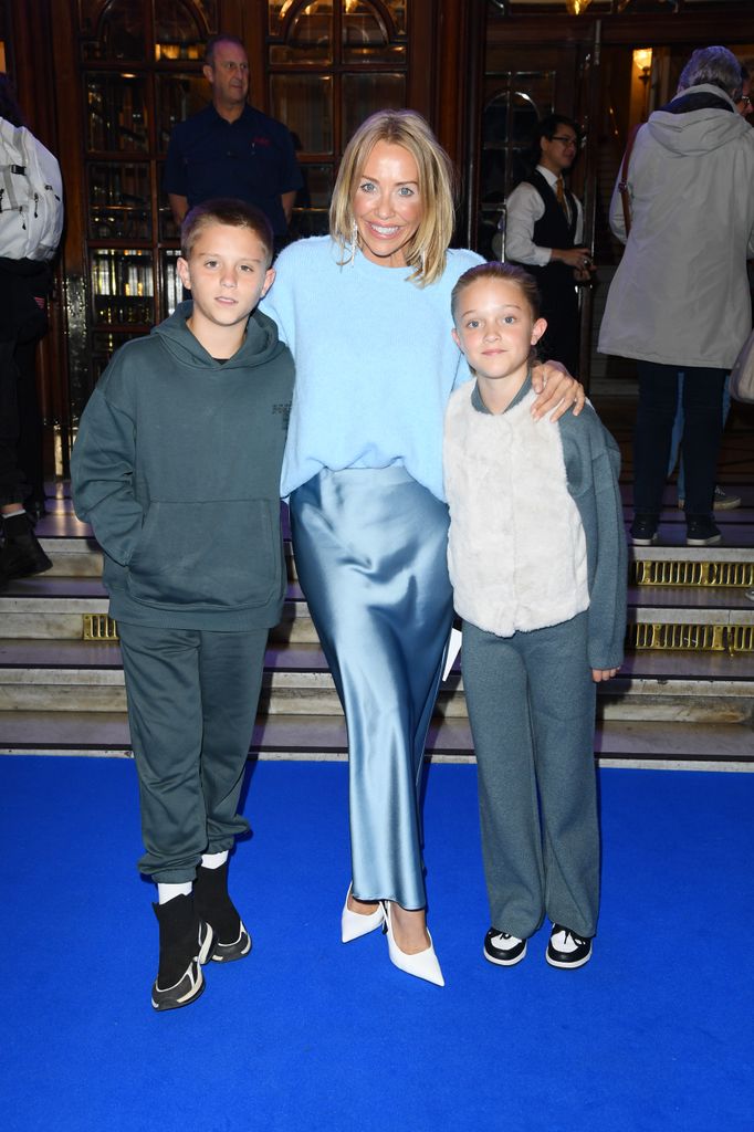 Laura Hamilton and children Rocco and Tahlia attend the "Blue Man Group: Bluevolution" UK premiere at The London Palladium on September 25, 2024 in London, England