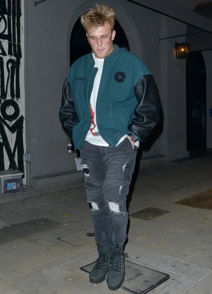 Jake Paul in a blue and black jacket