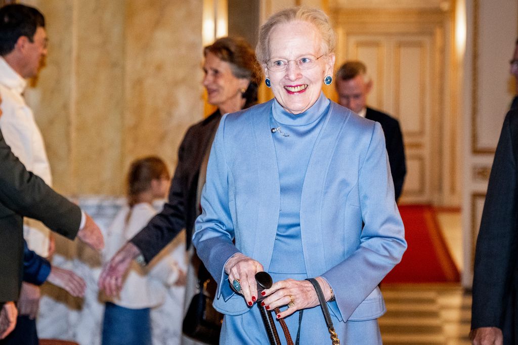 Queen Margrethe wearing a blue dress