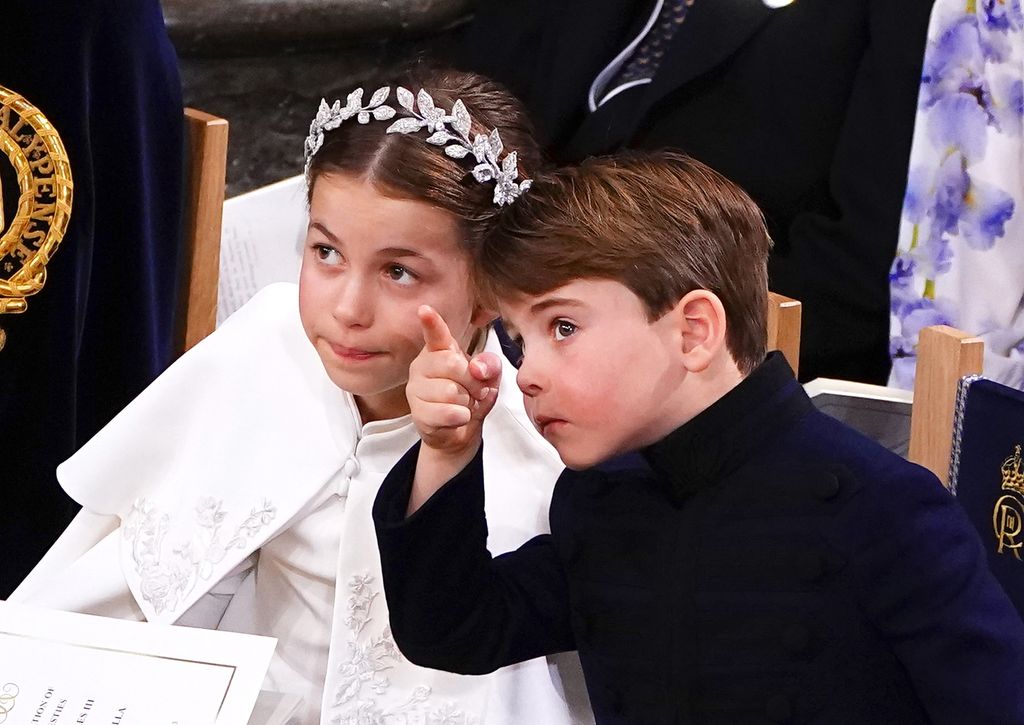 Britain's Prince Louis and Princess Charlotte attend the Coronation of King Charles III and Queen Camilla at Westminster Abbey on May 6, 2023 in London, England