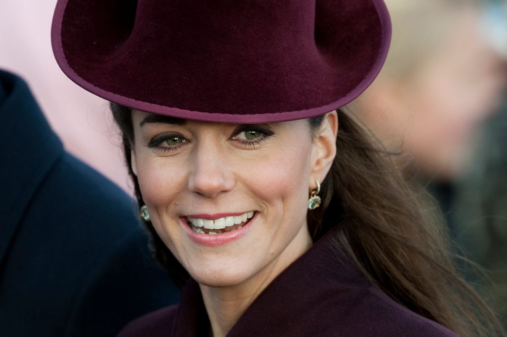 Catherine, Duchess of Cambridge arrives ahead of the British Royal family Christmas Day church service at St Mary Magdalene Church in Sandringham, Norfolk, in the east of England, on December 25, 2011. 